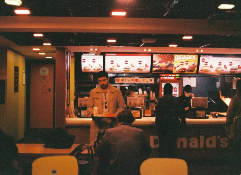 How to Build a Content Ecosystem Beyond TikTok: Step-by-Step... — A retro-themed fast food restaurant scene with people ordering and dining inside