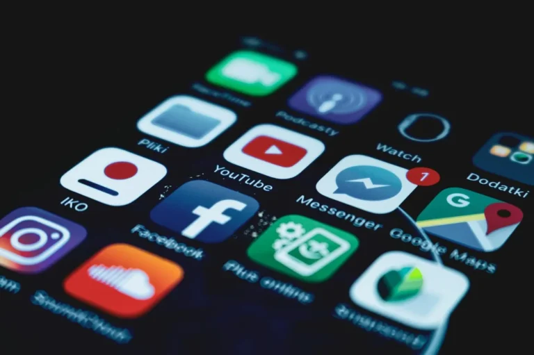 How to Post on TikTok Consistently Without Burning Out: Step... — Detailed close-up view of a smartphone screen displaying various popular social